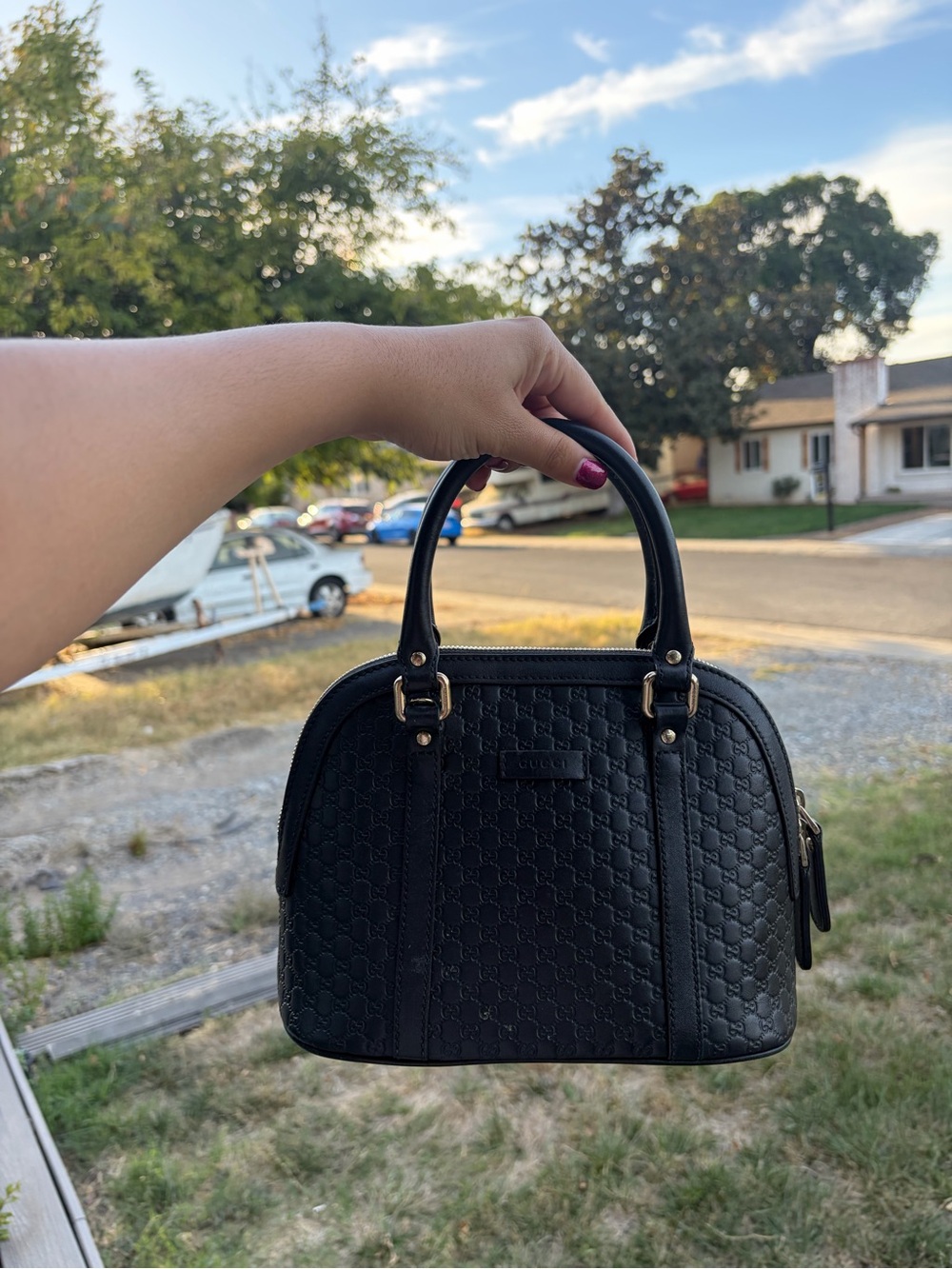 Gucci Black Embossed Leather Top-Handle Satchel with Gold Hardware
